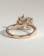 Rose :: designer emerald pear hidden halo ring rose gold bold look