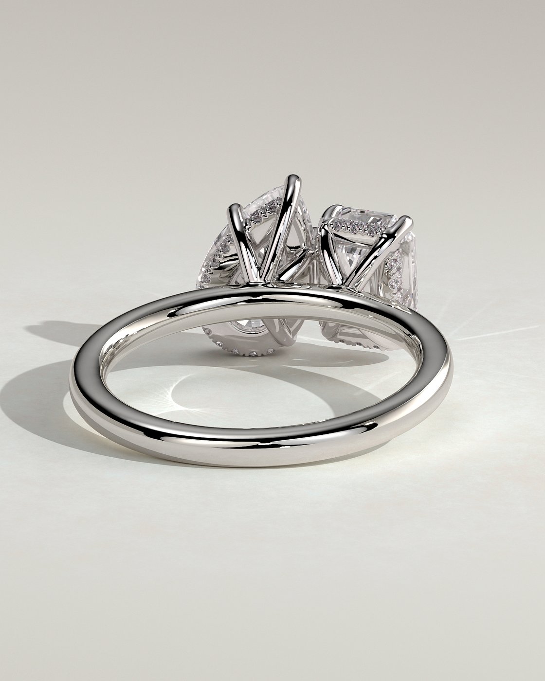 White :: designer emerald pear hidden halo engagement ring white gold unique two stone ring