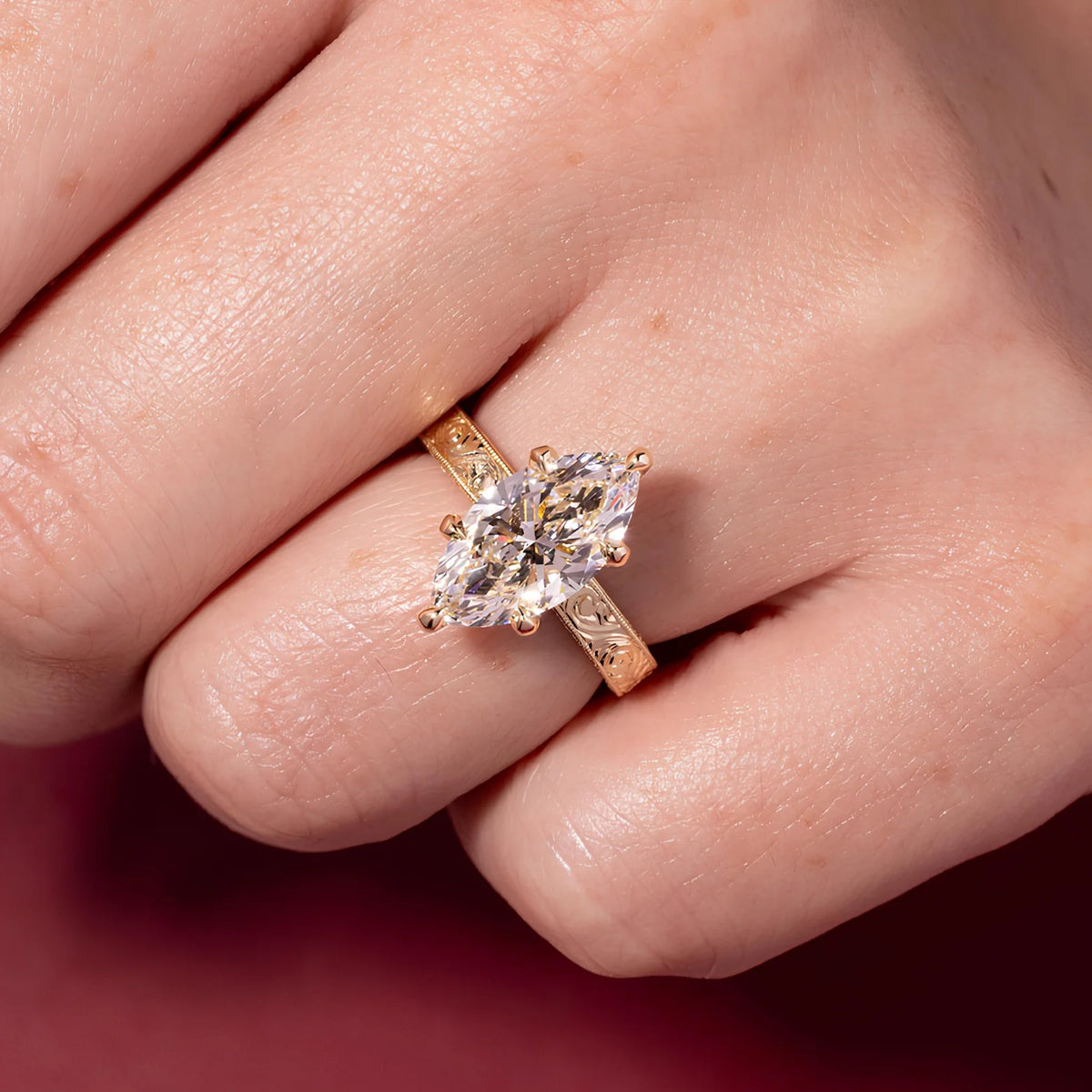 Common :: Marquise-shaped lab grown diamond ring featuring D–E–F color and VVS–VS clarity.