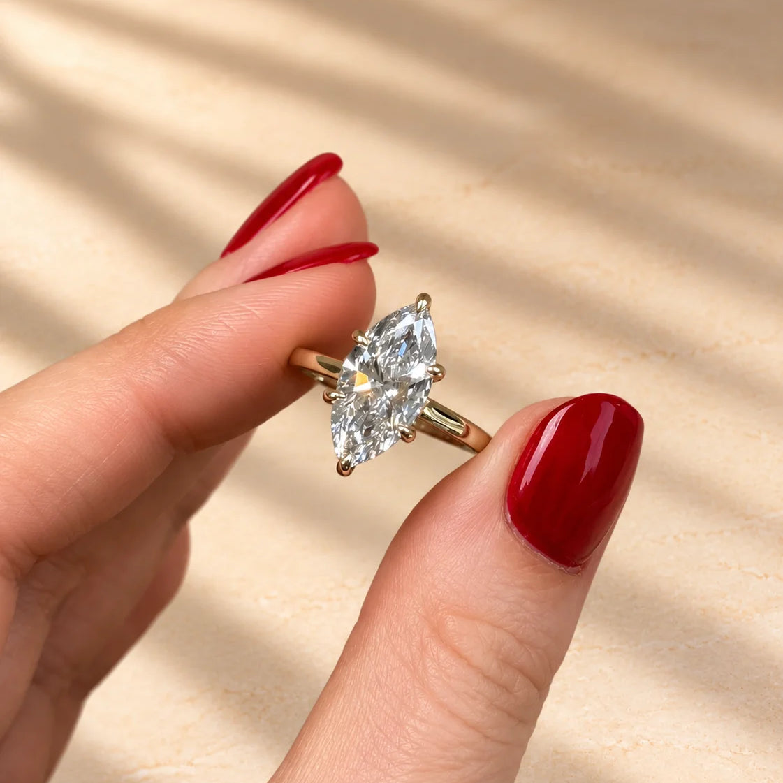 Common :: 2.10TCW marquise lab grown diamond hidden halo engagement ring with round diamond accents.