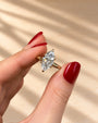 Common :: 2.10TCW marquise lab grown diamond hidden halo engagement ring with round diamond accents.