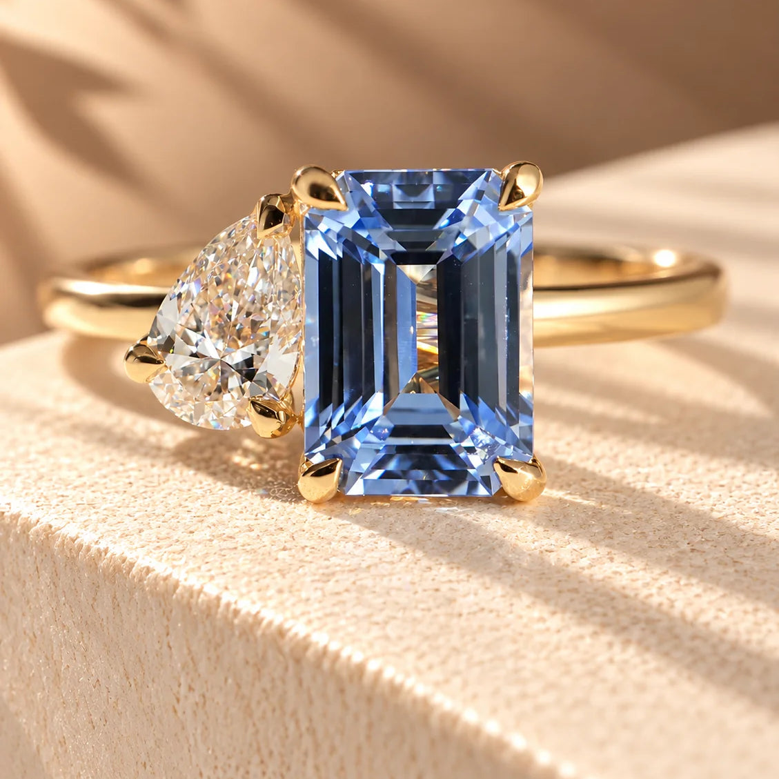 Common :: Unii Jewels 2.50TCW Blue Emerald and Pear Toi Et Moi engagement ring