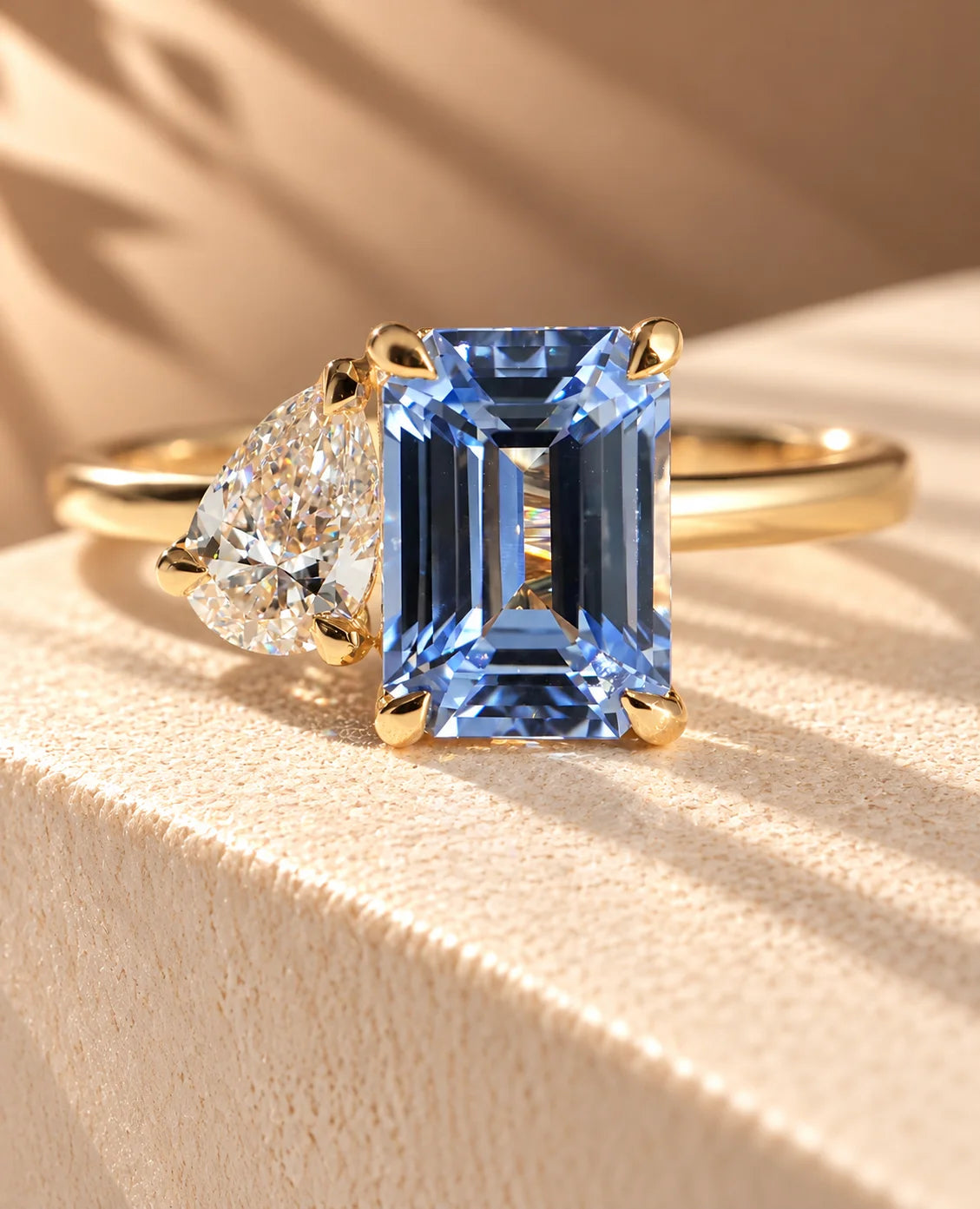 Common :: Unii Jewels 2.50TCW Blue Emerald and Pear Toi Et Moi engagement ring