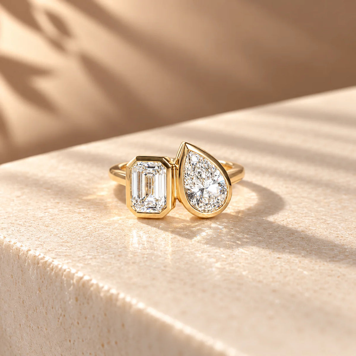 Common :: Unii Jewels 2.50TCW Pear and Emerald Toi Et Moi bezel engagement ring