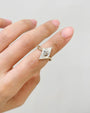 Common :: Lozenge Step Cut diamond bypass inspired engagement ring on hand