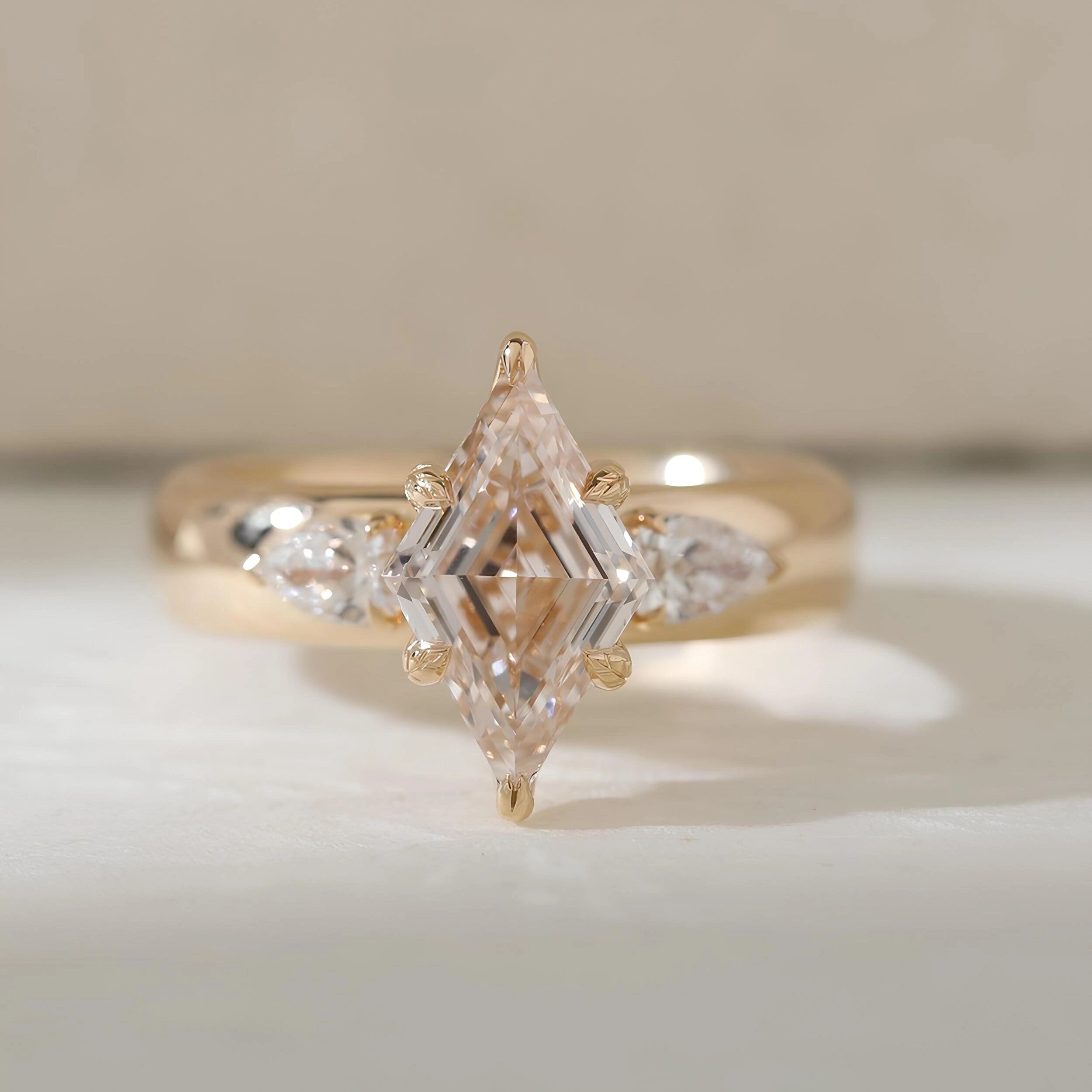 Common :: Unii Jewels 2.20TCW lozenge lab grown diamond three stone engagement ring