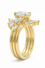 Common:: Handcrafted Art Deco engagement ring with an emerald cut lab grown diamond and architectural vintage styling in precious metal.