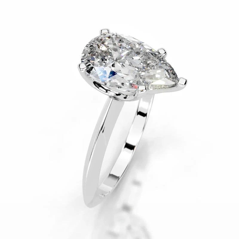 White :: IGI certified Celestara pear lab grown diamond ring elegant solitaire design