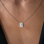 white :: elongated cushion halo pendant with modern sophistication