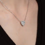 white :: 1.5 CT Arianza heart halo pendant with graceful brilliance