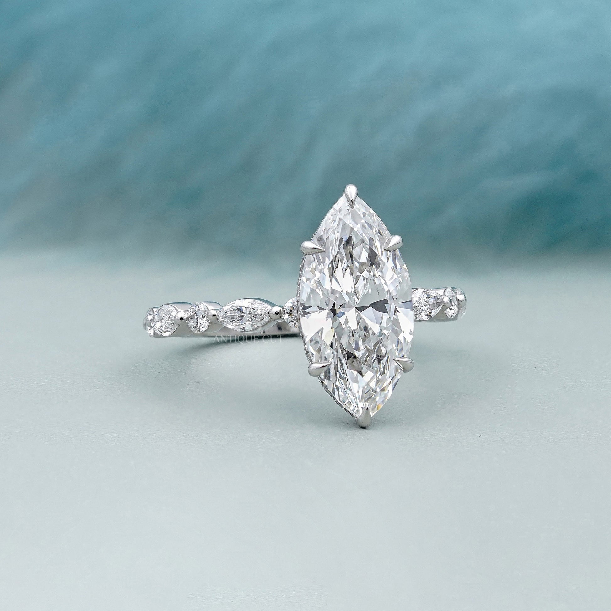 3.00ct Marquise Engagement Ring with 0.60ct Marquise & Round Side Stones | Unique Diamond Halo Ring | White Gold Marquise Solitaire