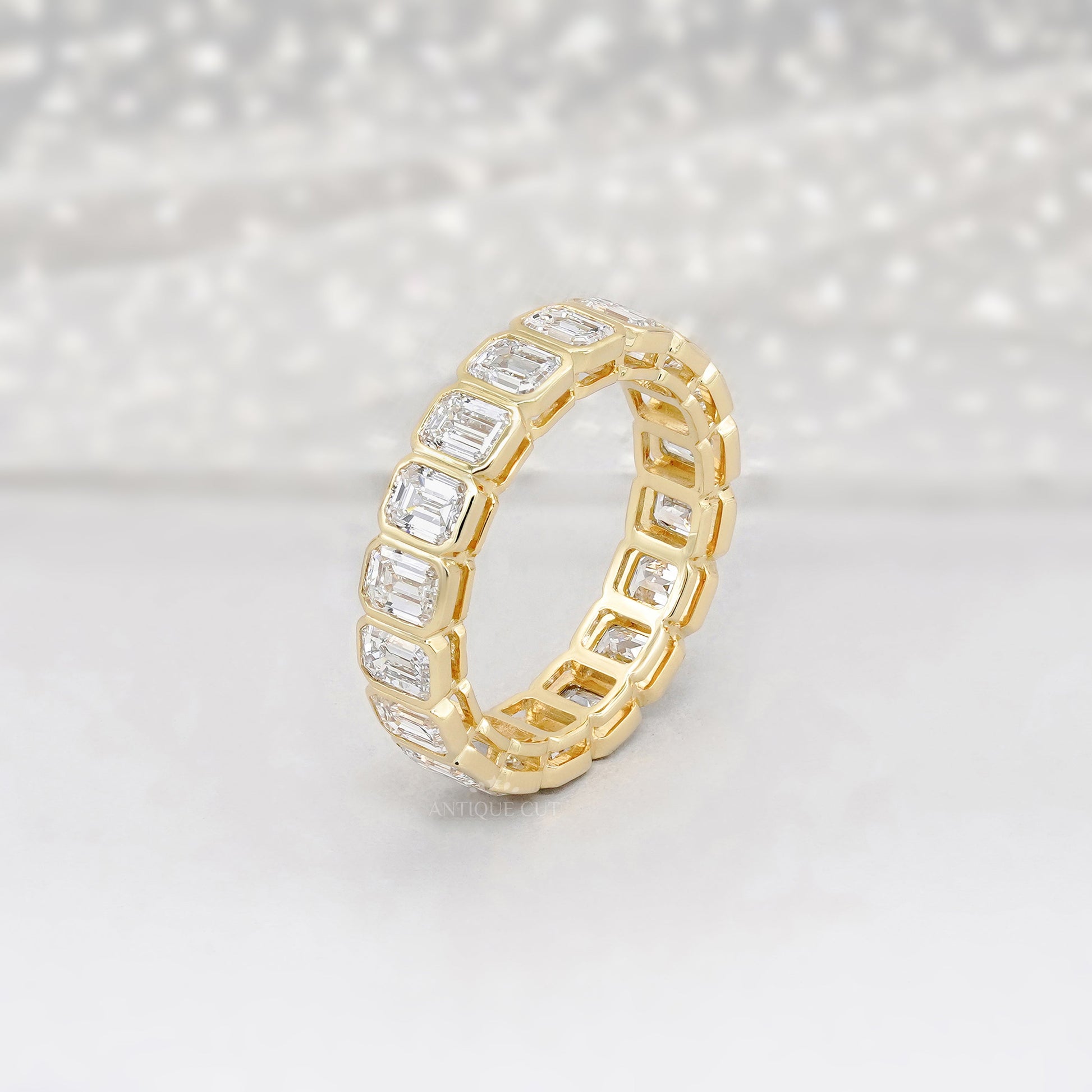 Emerald Cut 3.60tcw Lab Diamond Eternity Band | IGI Certified | Yellow Gold
