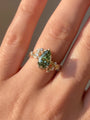 Common :: 2.00CT green pear-shaped lab grown diamond engagement ring with IGI-certified center stone.