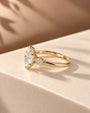 Common :: 2ct Oval lab grown diamond engagement ring with Pear side diamonds