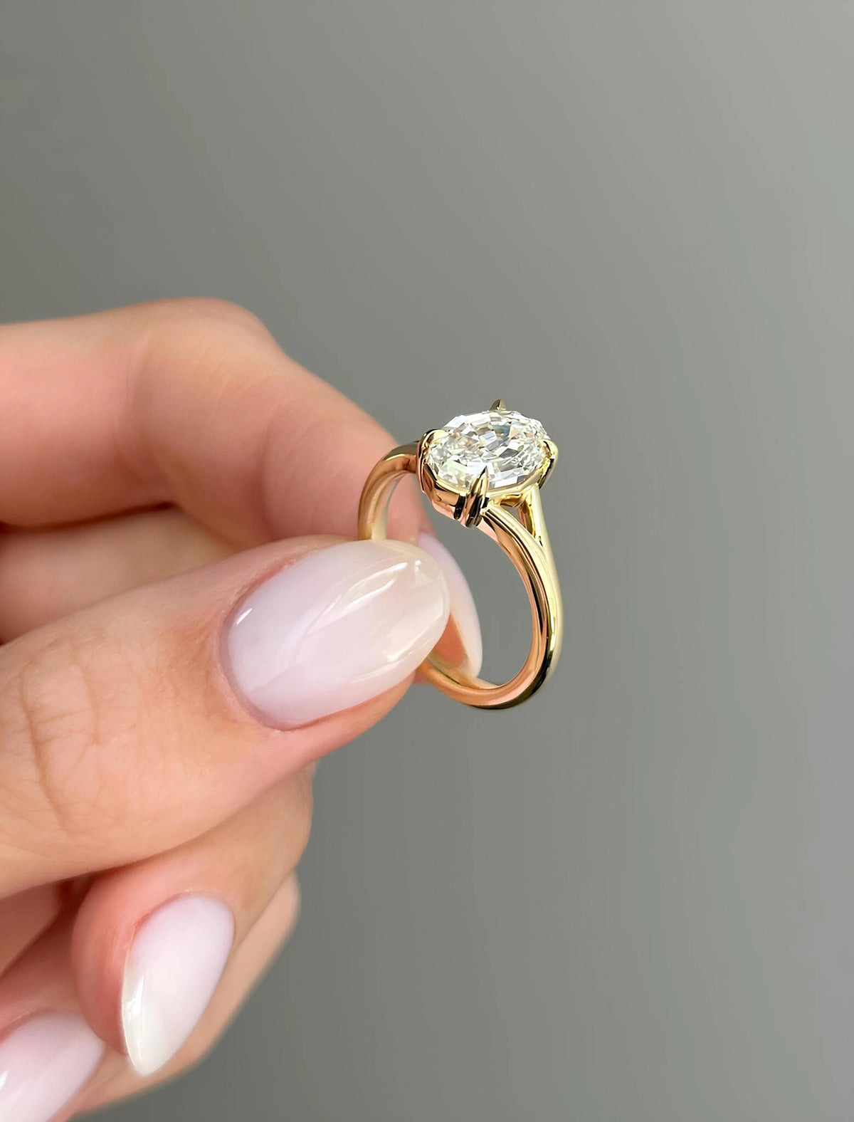 Common :: 2ct D color VS1 step cut oval diamond solitaire ring by Unii Jewels