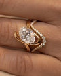 Common :: 2.00ct oval lab grown diamond solitaire ring with flowing metal design