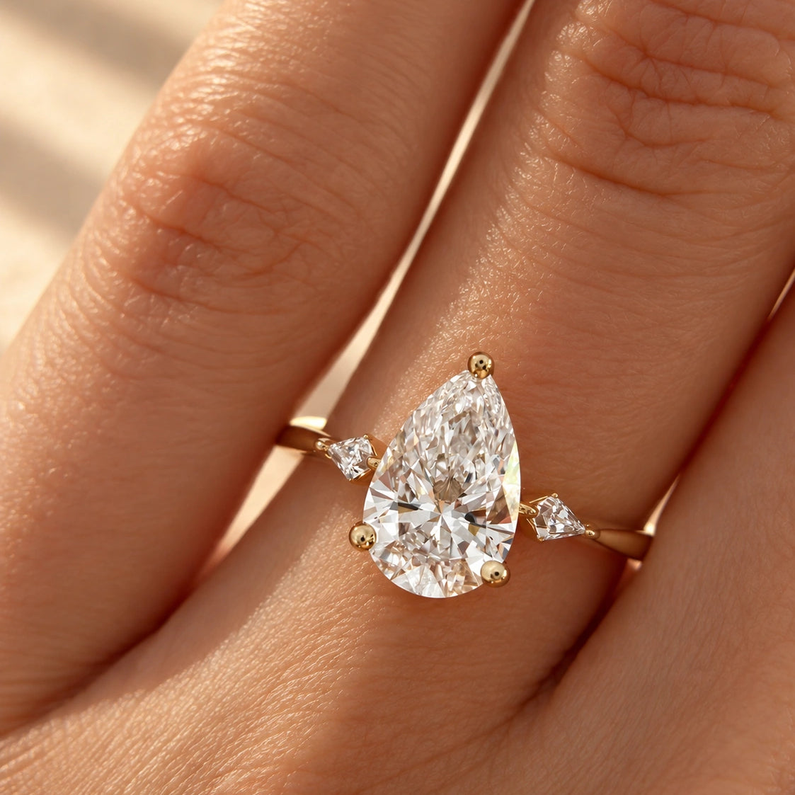 Common :: 2ct Pear lab grown diamond engagement ring with Kite side diamonds