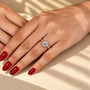 Common :: 2CT Round center diamond with 0.50TCW Round accents