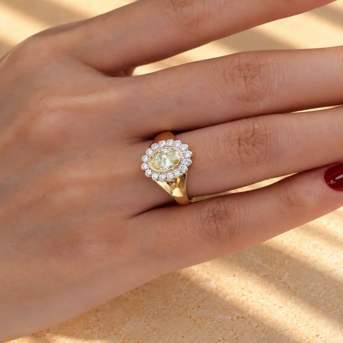 Common :: 2.00CT yellow oval center diamond in a halo-style engagement ring