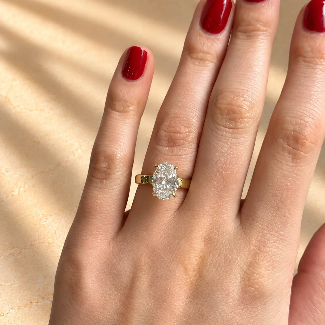 Common :: Oval lab grown diamond ring featuring D–E–F color and VVS–VS clarity.