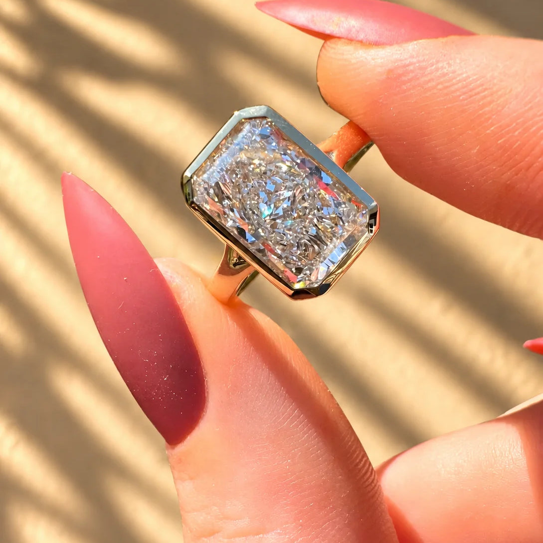 Common :: IGI-certified 3-carat radiant-cut lab-grown diamond in a sleek bezel setting