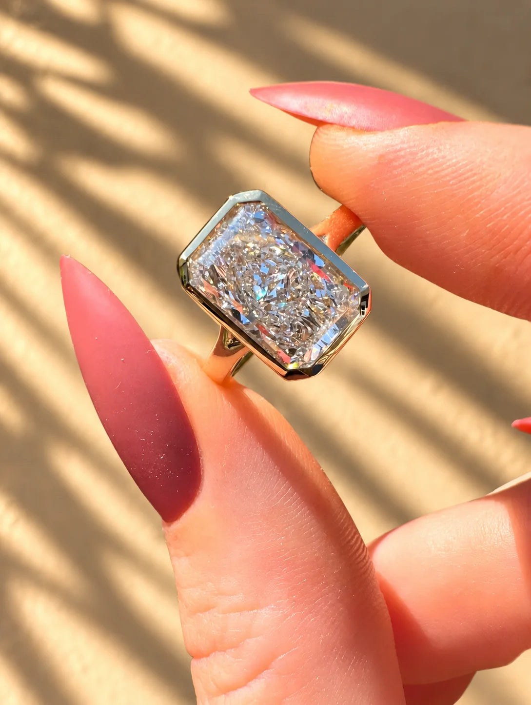 Common :: IGI-certified 3-carat radiant-cut lab-grown diamond in a sleek bezel setting