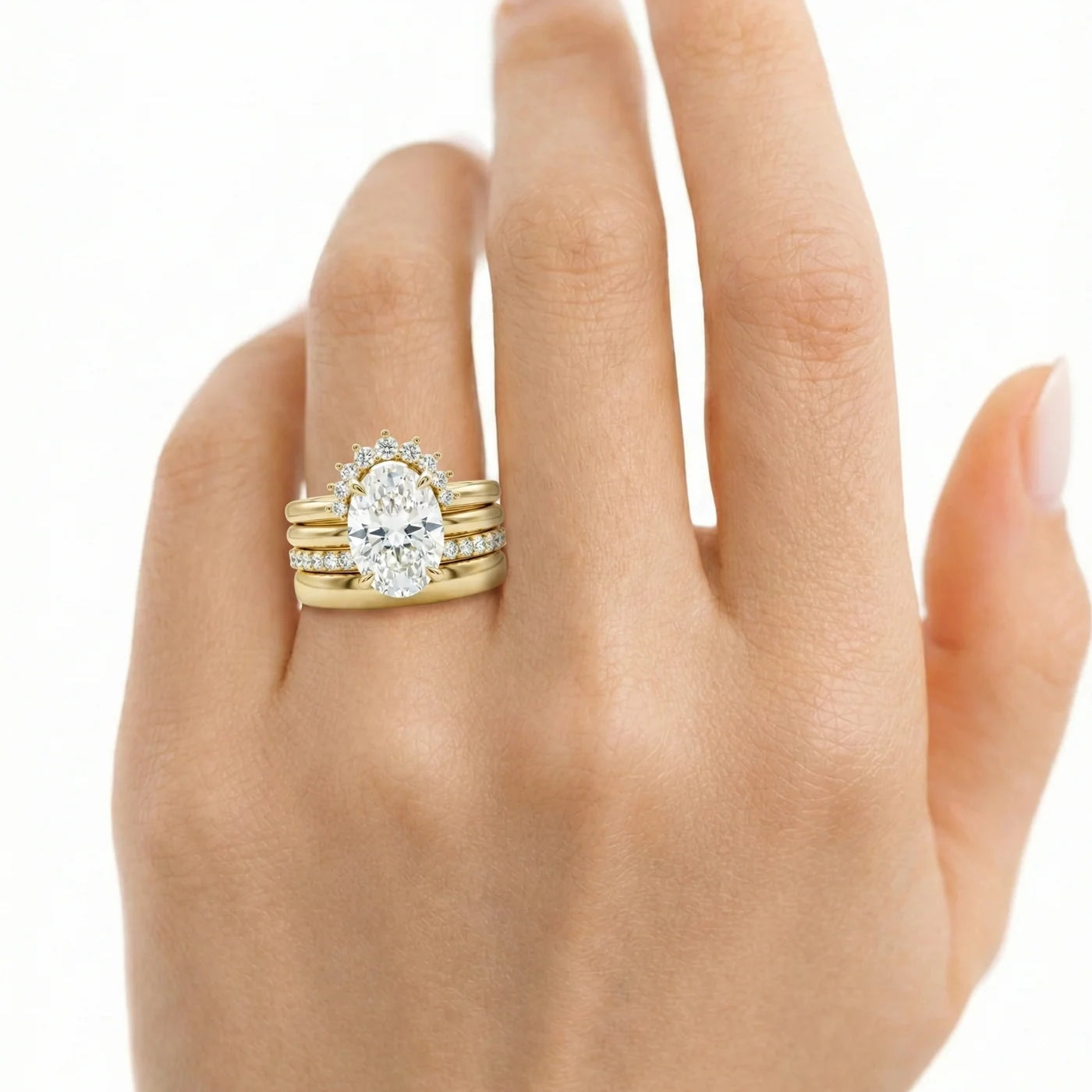 Common :: Luxury oval bridal stack featuring four distinctive diamond bands and IGI certified diamonds.
