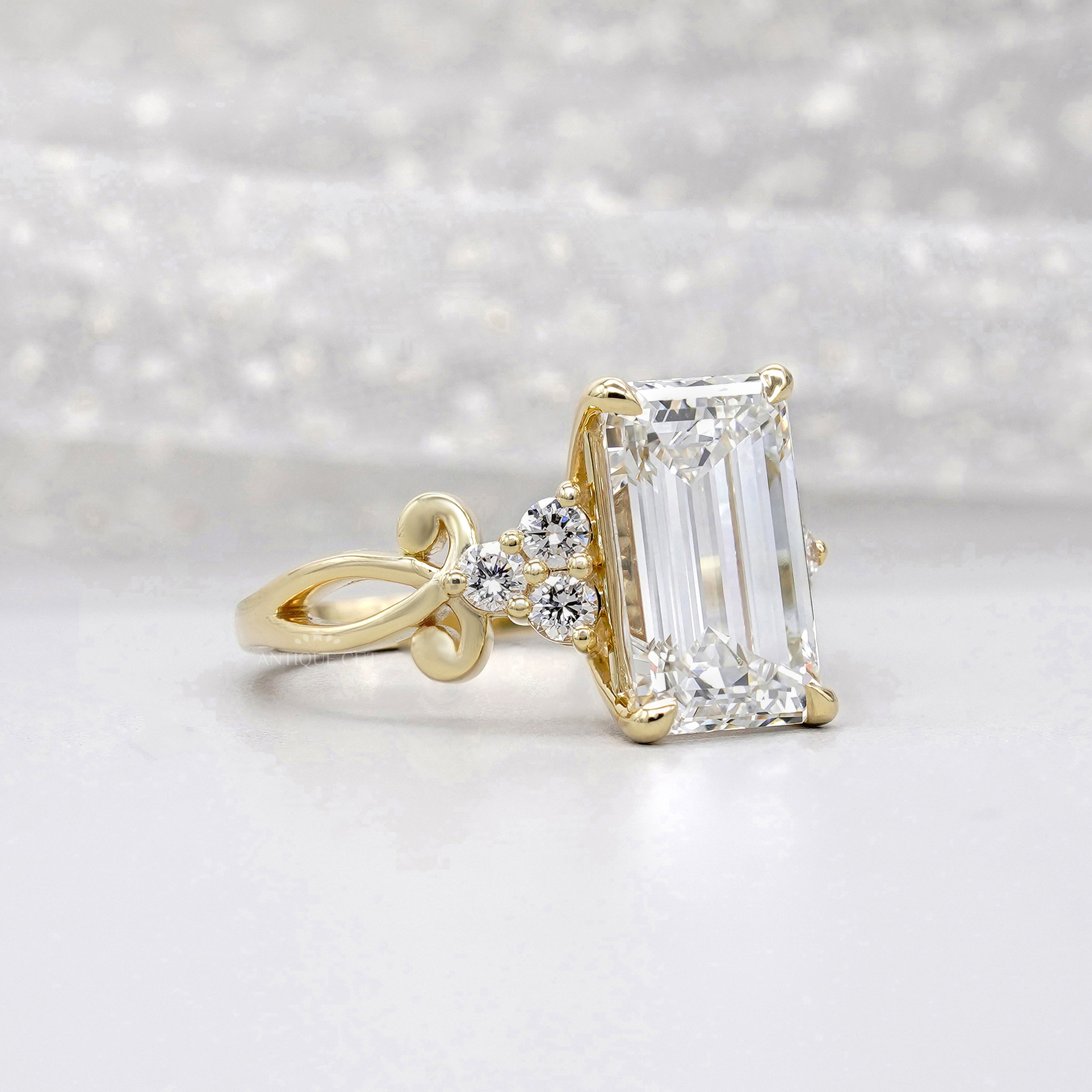 Emerald 5.30tcw Lab Grown Diamond Engagement Ring | Yellow Gold Fleur-de-Lis Setting | IGI Certified