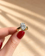 Common :: 3.00CT oval lab grown diamond solitaire engagement ring with IGI-certified center stone.