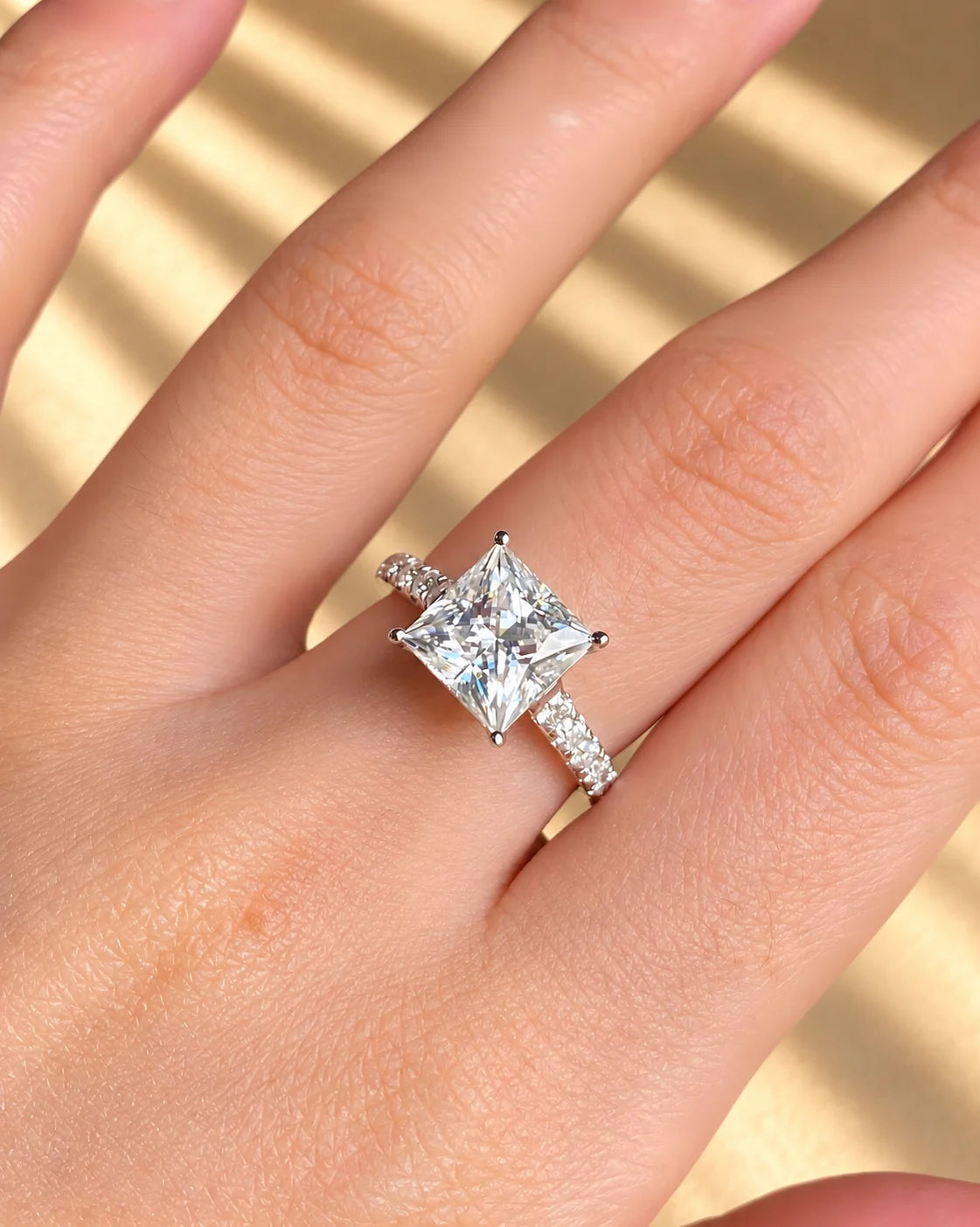 Common :: 3.00CT princess-cut lab grown diamond engagement ring with IGI-certified center stone.
