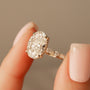 Common :: 4.50CT oval lab grown diamond engagement ring with IGI-certified center stone.
