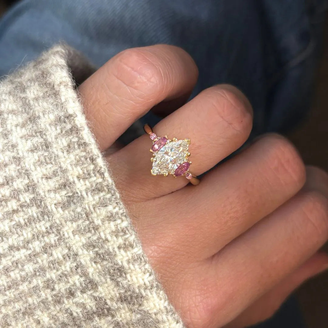 Common :: 1.5 carat marquise diamond cluster engagement ring IGI certified