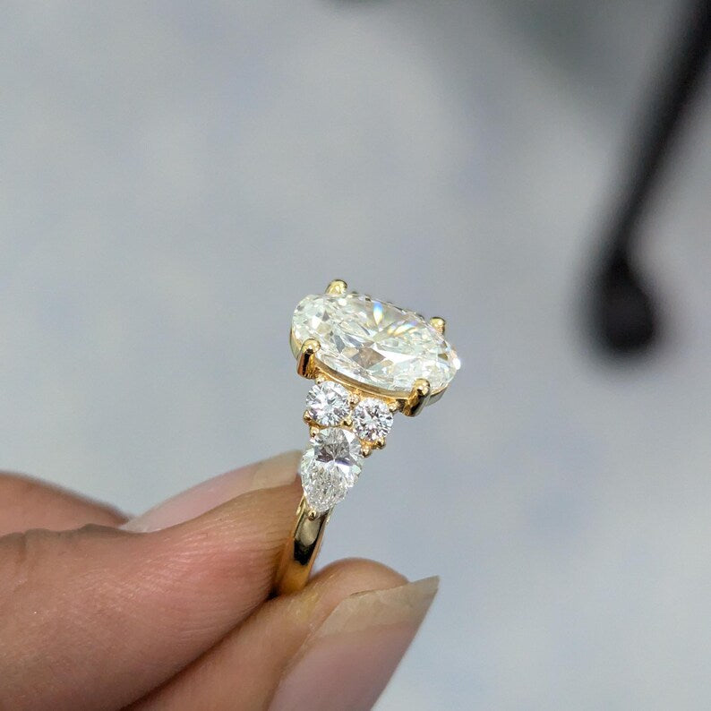 Oval 3.80tcw Lab Grown Diamond Pear Side Stone Engagement Ring, D-E-F Color, VVS-VS Clarity, IGI Certificate