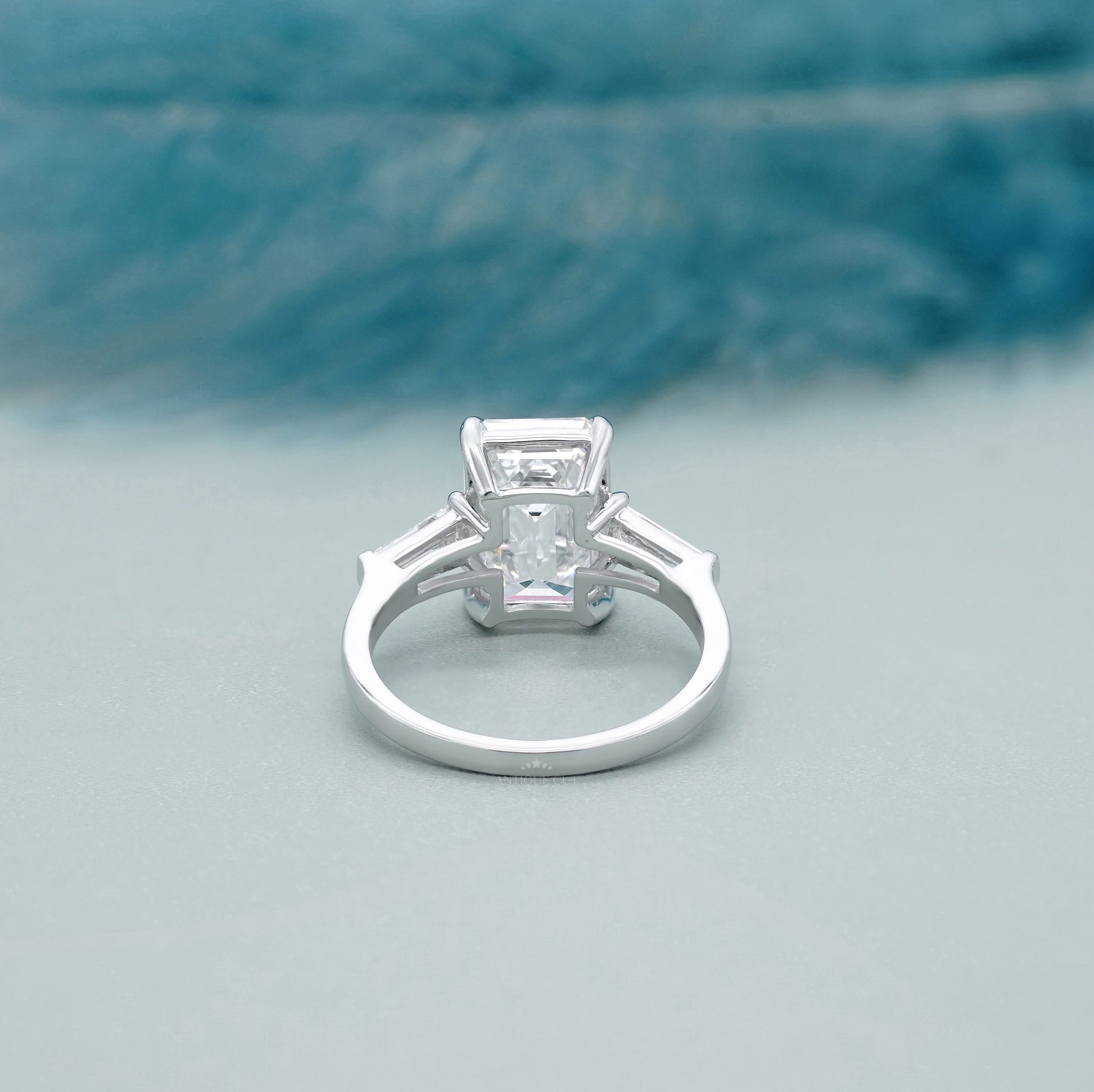 Emerald Cut 5.60tcw Lab Grown Diamond Three Stone Engagement Ring | Baguette Side Stones | Platinum/White Gold | IGI Certified
