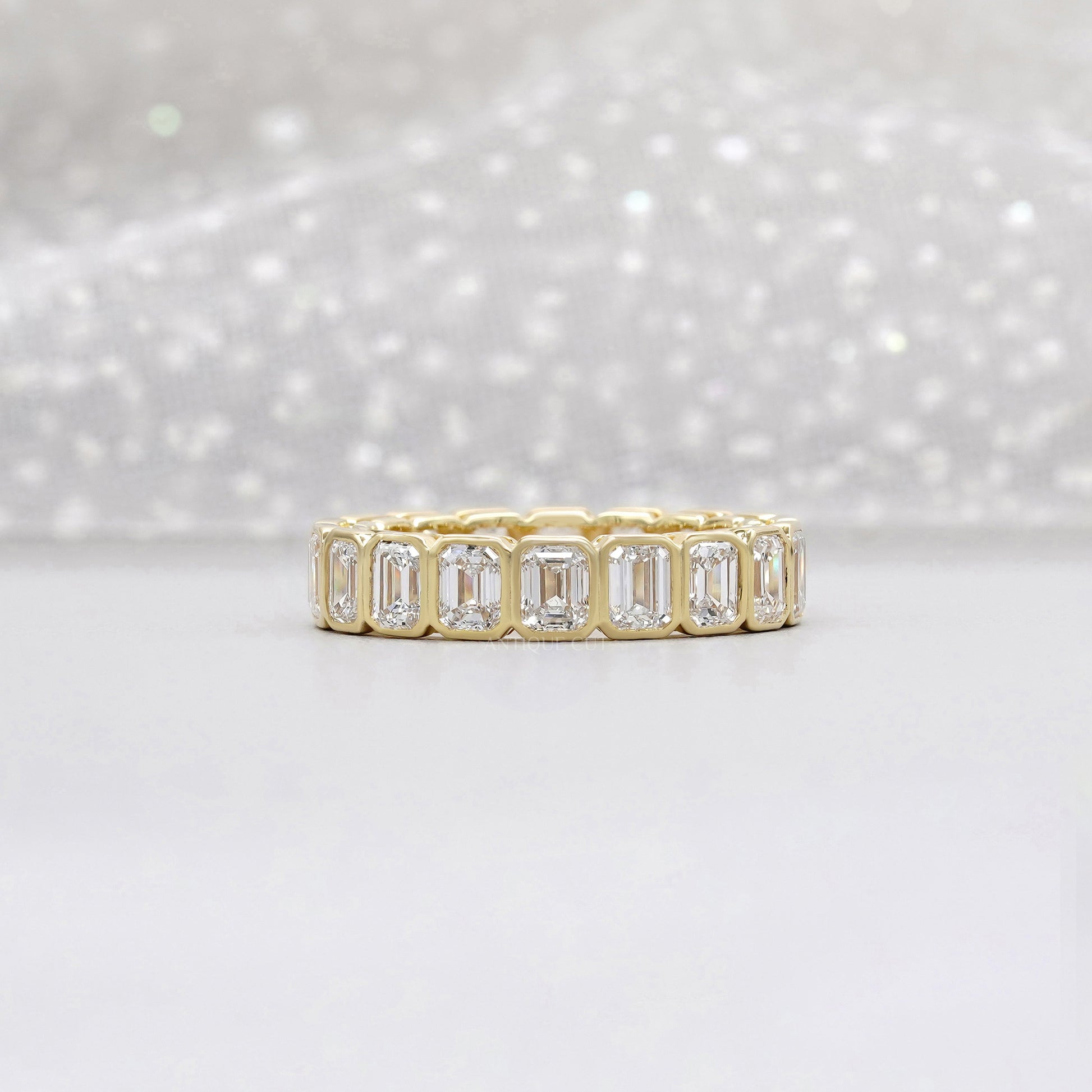 Emerald Cut 3.60tcw Lab Diamond Eternity Band | IGI Certified | Yellow Gold