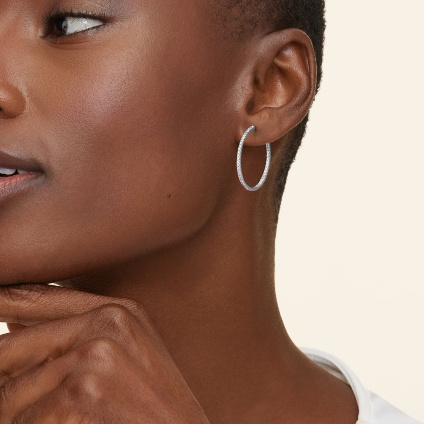 White|Rose :: delicate lab grown diamond huggie hoops white gold minimal design subtle sparkle everyday luxury earrings