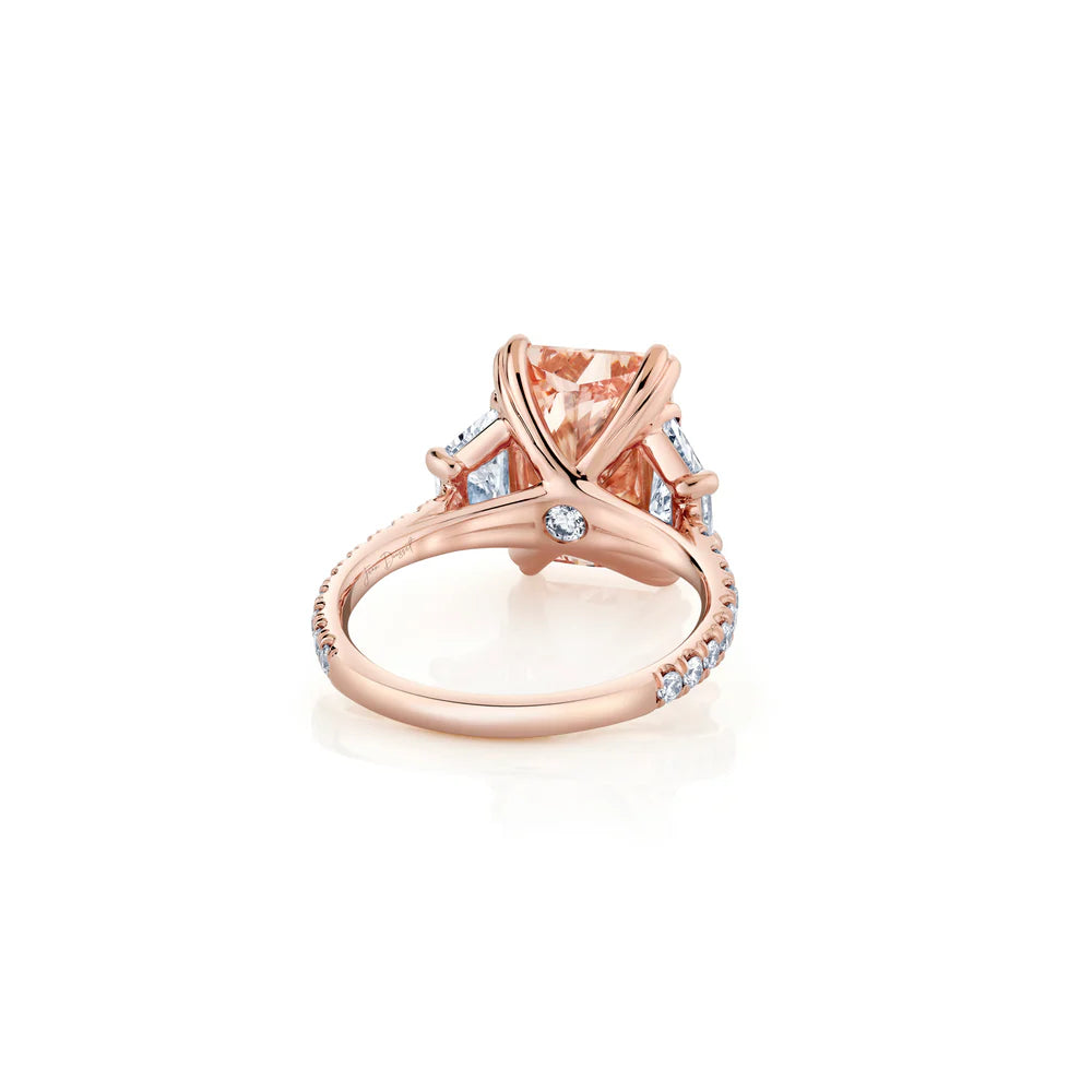 Common :: close up 5.06 carat pink radiant diamond engagement ring three stone design