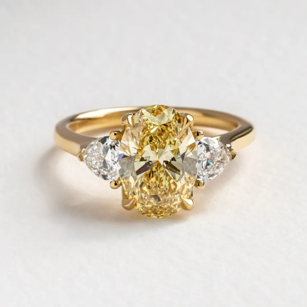 Common :: Arvoria 2.58ct yellow oval three stone lab grown diamond engagement ring IGI certified