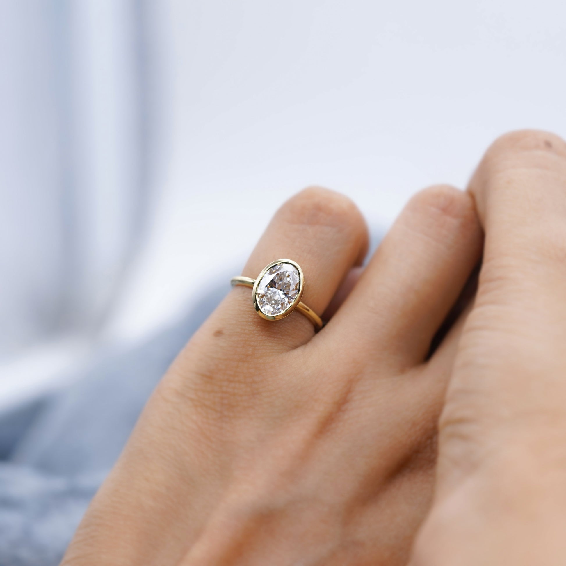 Oval Cut 2.00Carat Lab Diamond Engagement Ring | Bezel Setting in Yellow Gold | D-E-F Color, VVS–VS Clarity