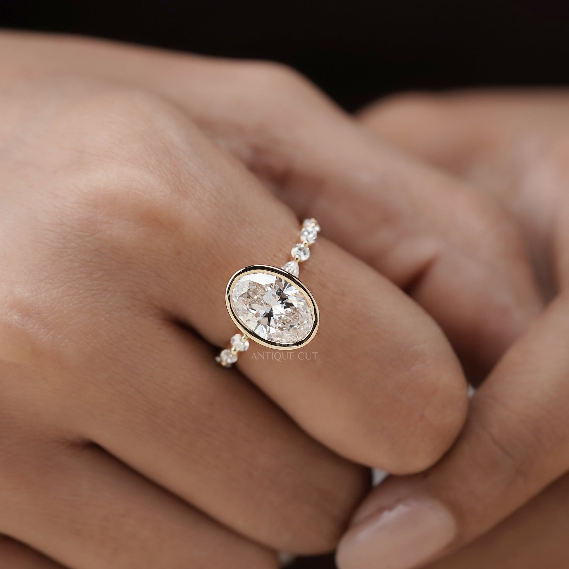 Oval 3.50tcw Bezel Set Lab Grown Diamond Engagement Ring | Yellow Gold with Side Stones | IGI Certified