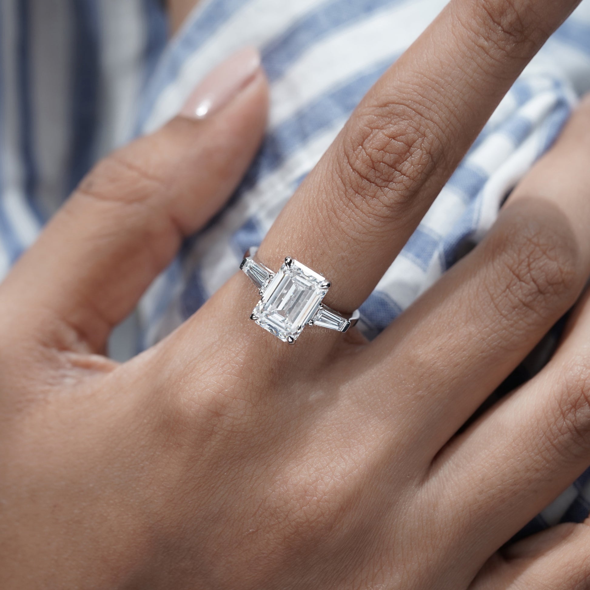 Emerald Cut 5.60tcw Lab Grown Diamond Three Stone Engagement Ring | Baguette Side Stones | Platinum/White Gold | IGI Certified