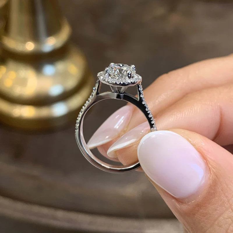 Common :: round halo lab grown diamond engagement ring with pavé band sparkle