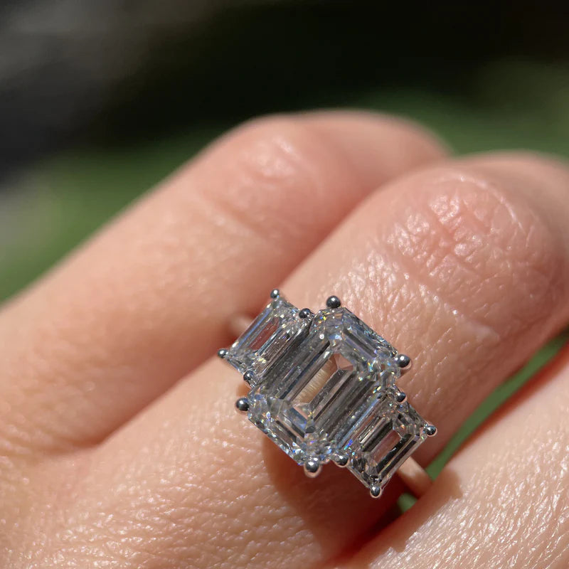 White :: emerald cut lab grown diamond three stone engagement ring with side stones