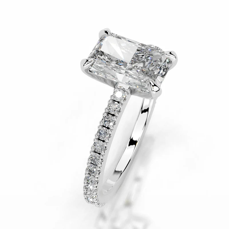 White :: Radiant cut lab grown diamond engagement ring with round diamond accents