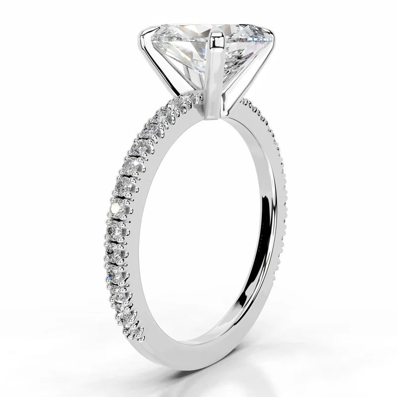 White :: IGI certified pear lab grown diamond ring with round accent stones