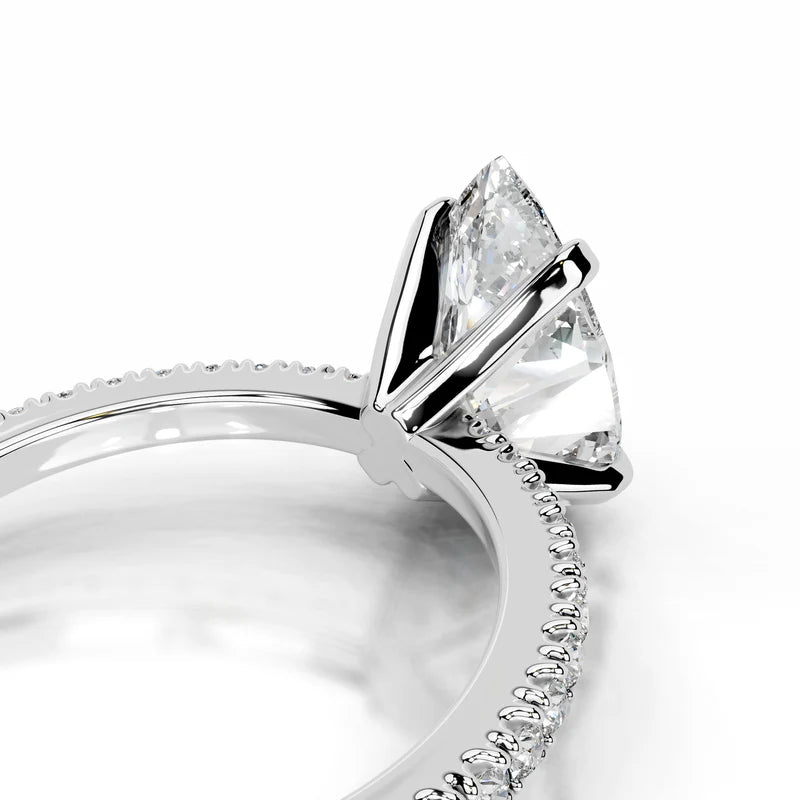 White :: Elegant pear cut lab diamond ring with round side stones solitaire design