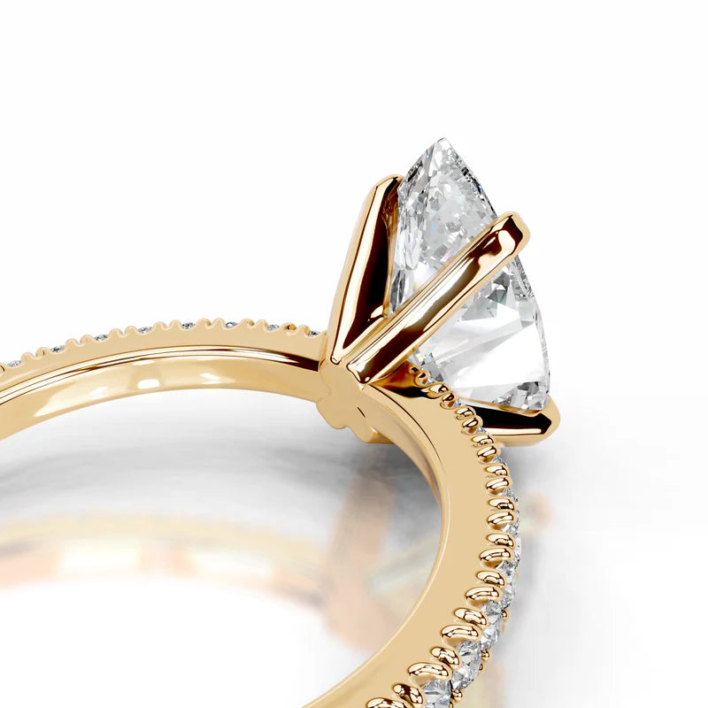 Yellow :: Pear shaped diamond ring lab grown with round side stones for proposal