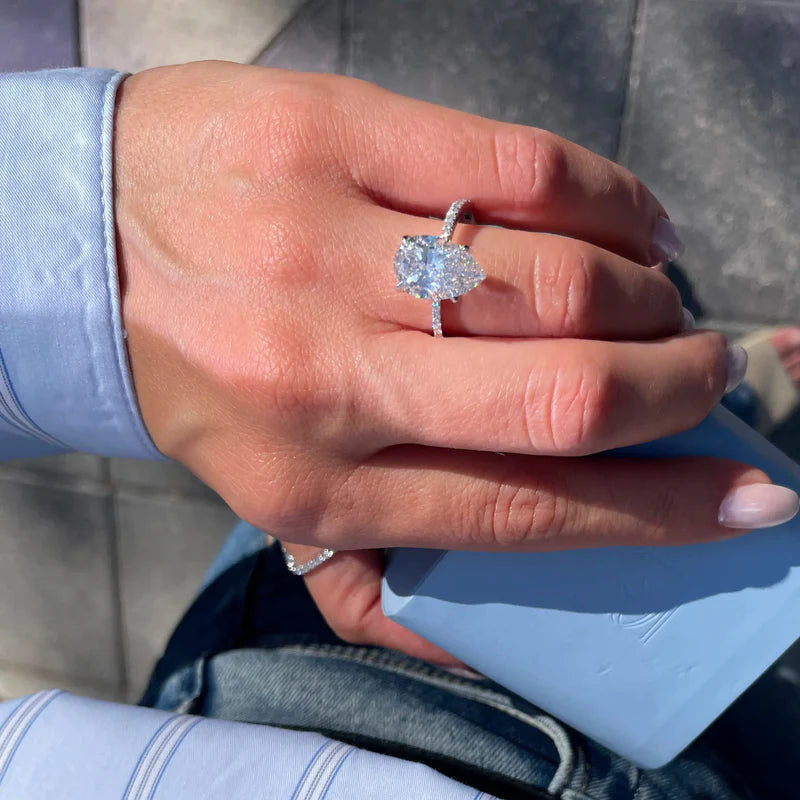White :: Pear cut lab diamond ring with round side stones elegant engagement jewelry