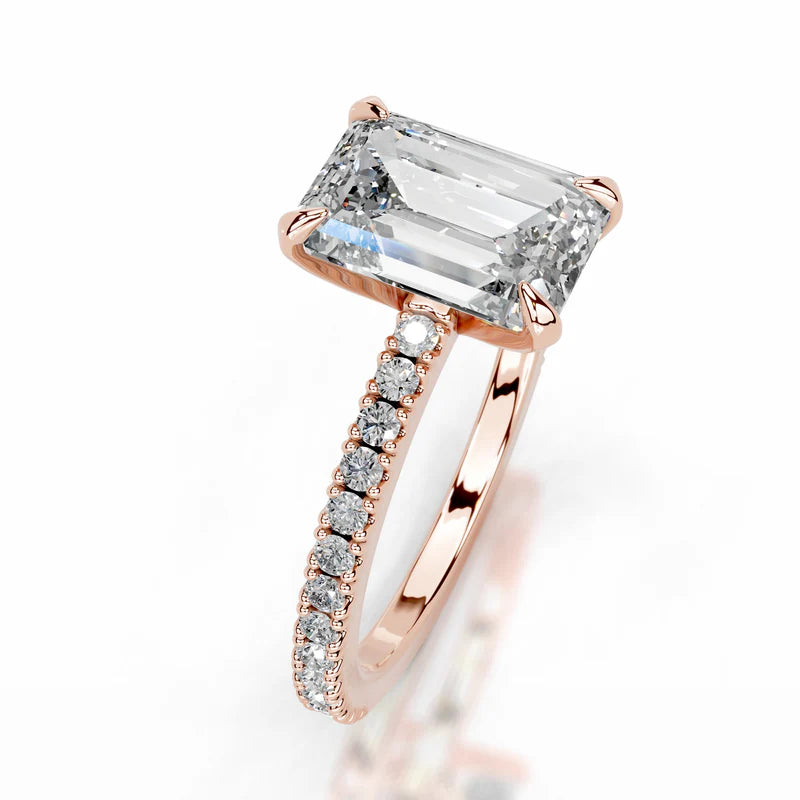 Rose :: IGI certified emerald diamond ring lab grown with round side stone design