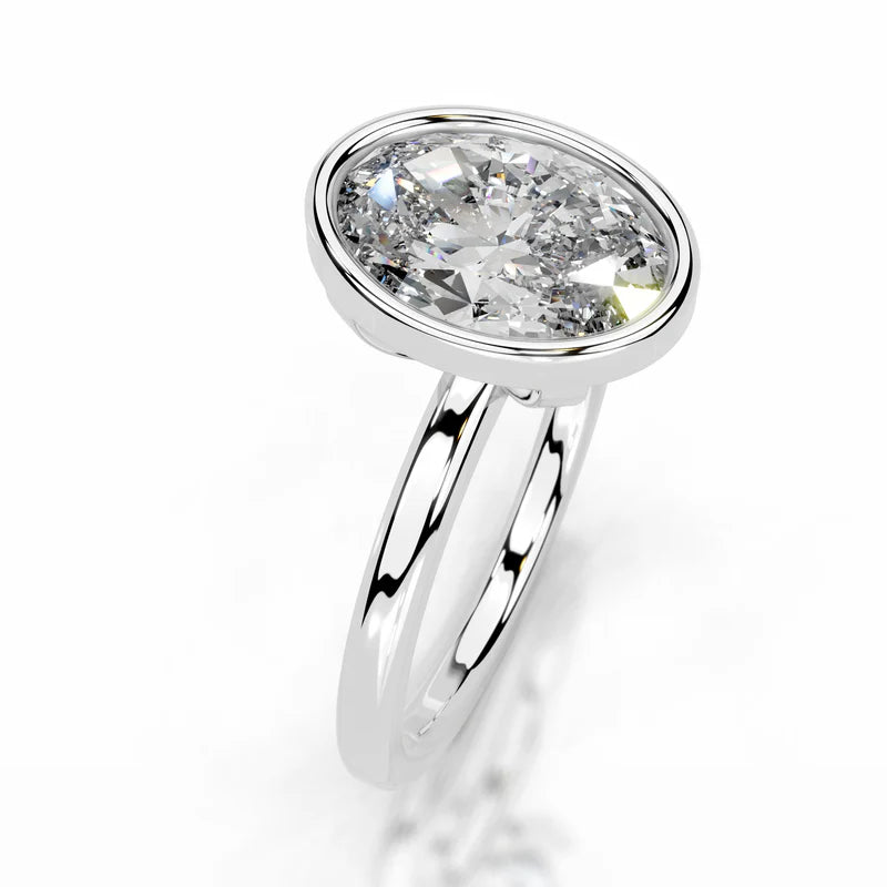 White :: Oval bezel set lab grown diamond engagement ring elegant solitaire